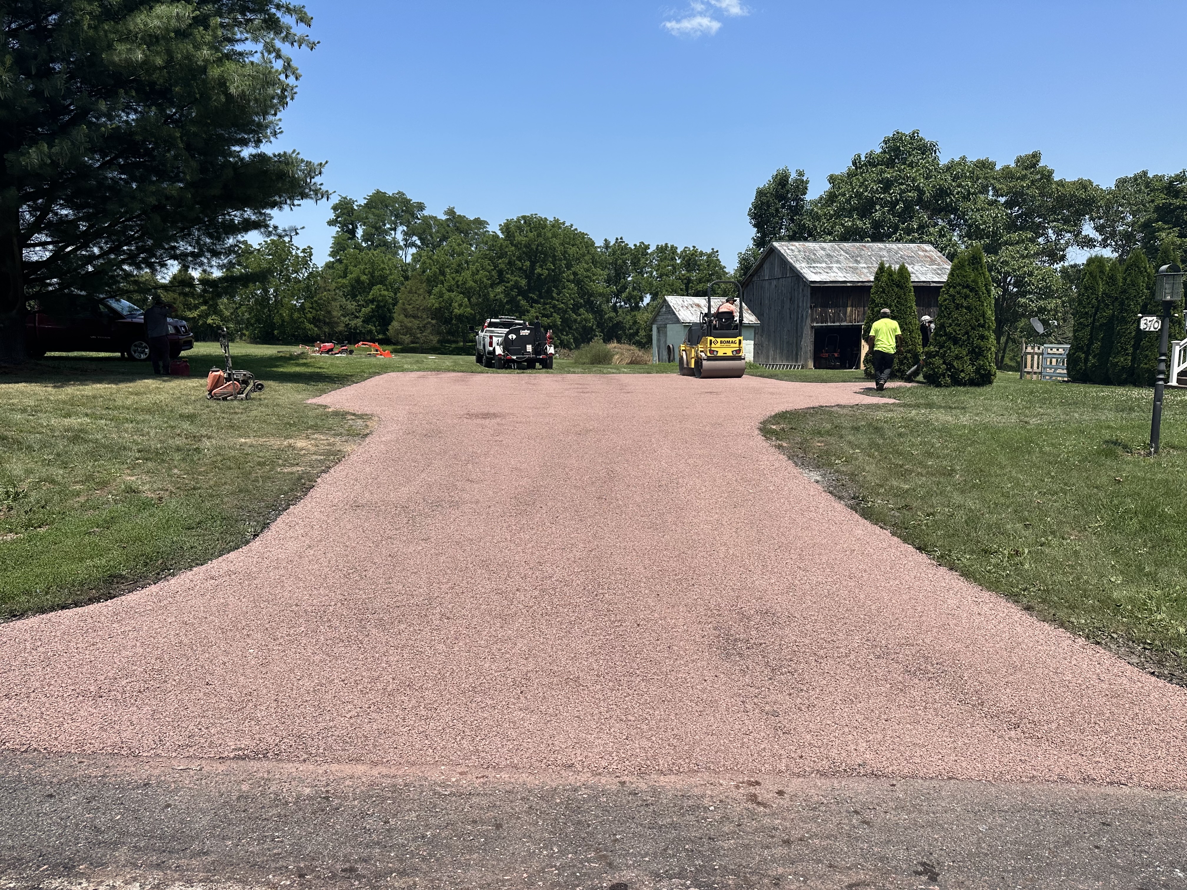 Chip seal driveway being laid in the Pacific Northwest